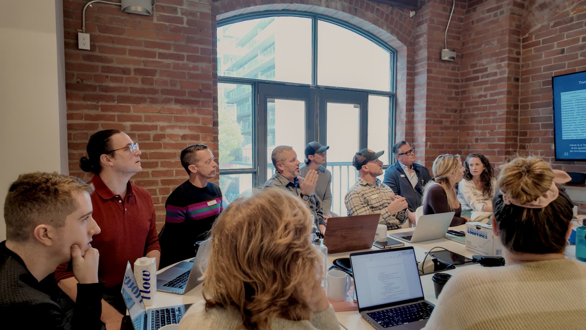 HostGenius members together at an industry conference